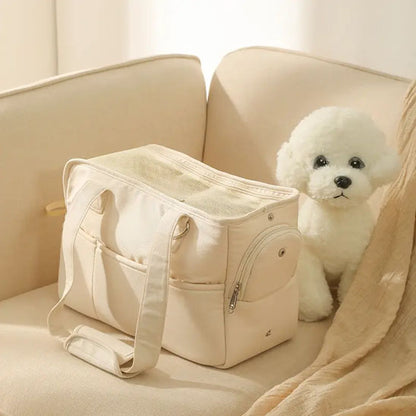 sac-de-transport-chien-à-une-epaule-beige-fauteuil